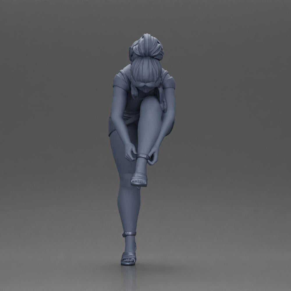 Diorama Modellbau Produktfoto 11: Diorama Figur: Miniaturfigur - Frau zieht roten High Heel an, stehende Pose für Diorama (Ref Nr. A112)