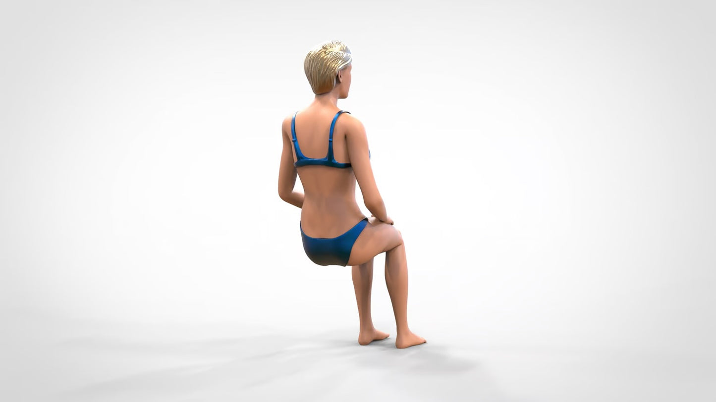 Produktfoto 0: Frau im Bikini - sitzend