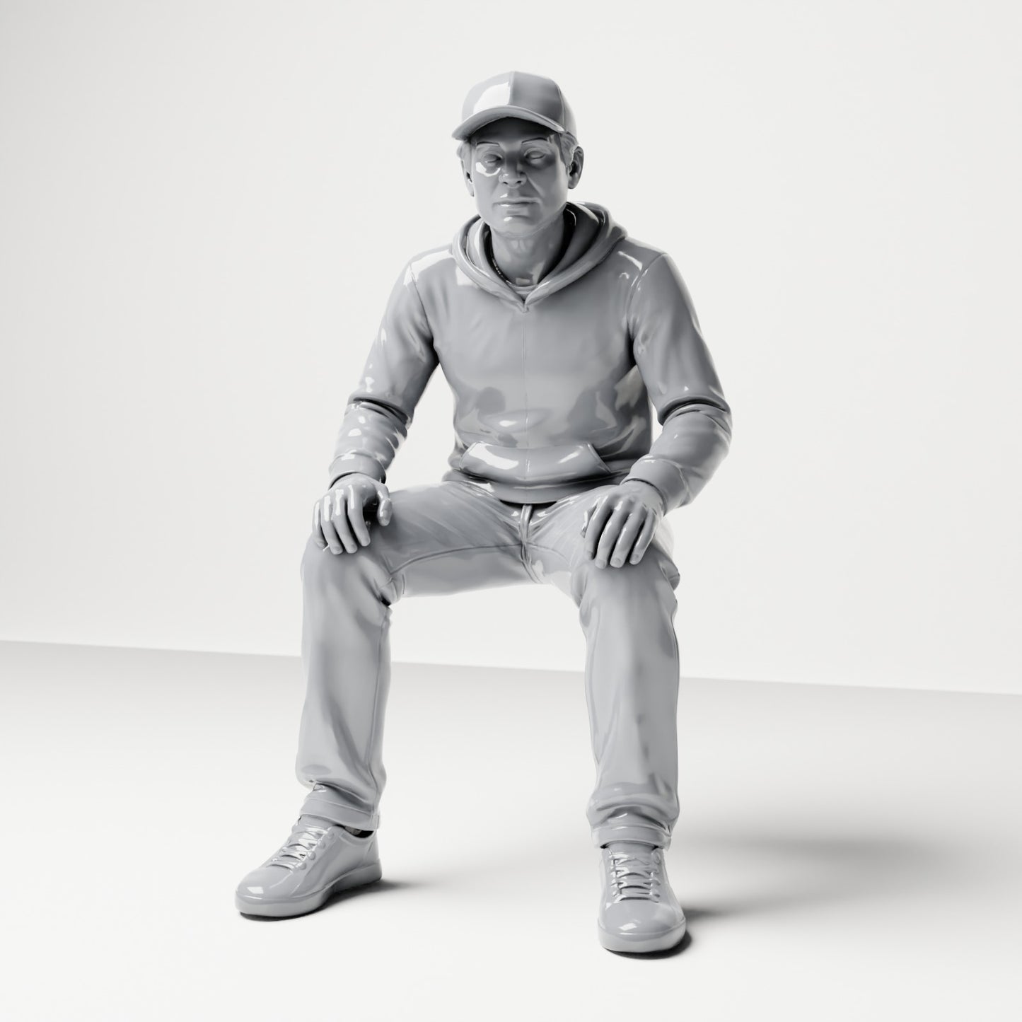 Diorama Modellbau Produktfoto 0: Sitzende Figur: Mann mit Kappe & Kapuzenpullover (B070)