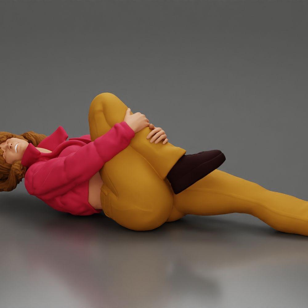 Diorama Modellbau Produktfoto 0: Liegende Frau mit Minijacke hält verletztes Knie - Diorama-Miniatur (Ref Nr. A87)