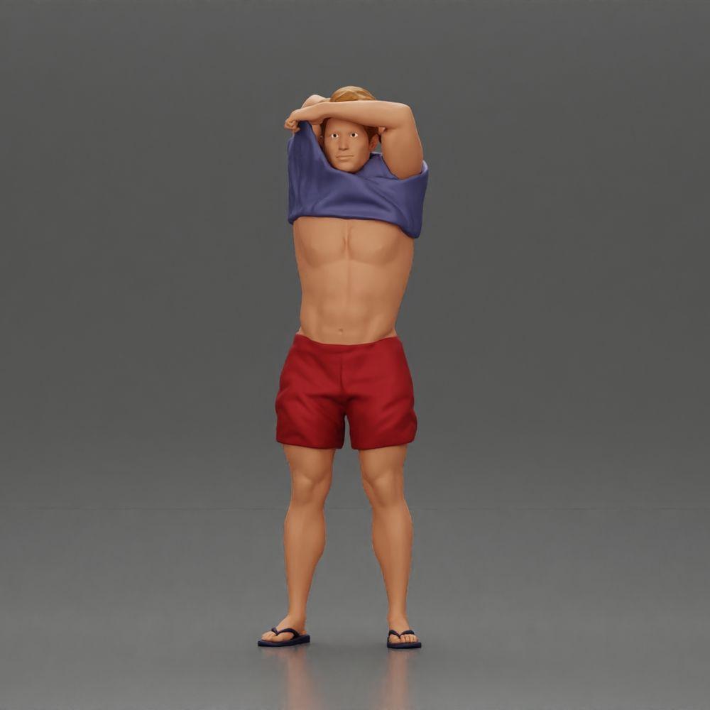 Diorama Modellbau Produktfoto 0: Stehende Miniatur: muskulöser Mann in Shorts zieht T-Shirt über den Kopf (Ref Nr. A90)