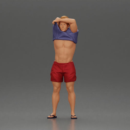 Diorama Modellbau Produktfoto 0: Stehende Miniatur: muskulöser Mann in Shorts zieht T-Shirt über den Kopf (Ref Nr. A90)