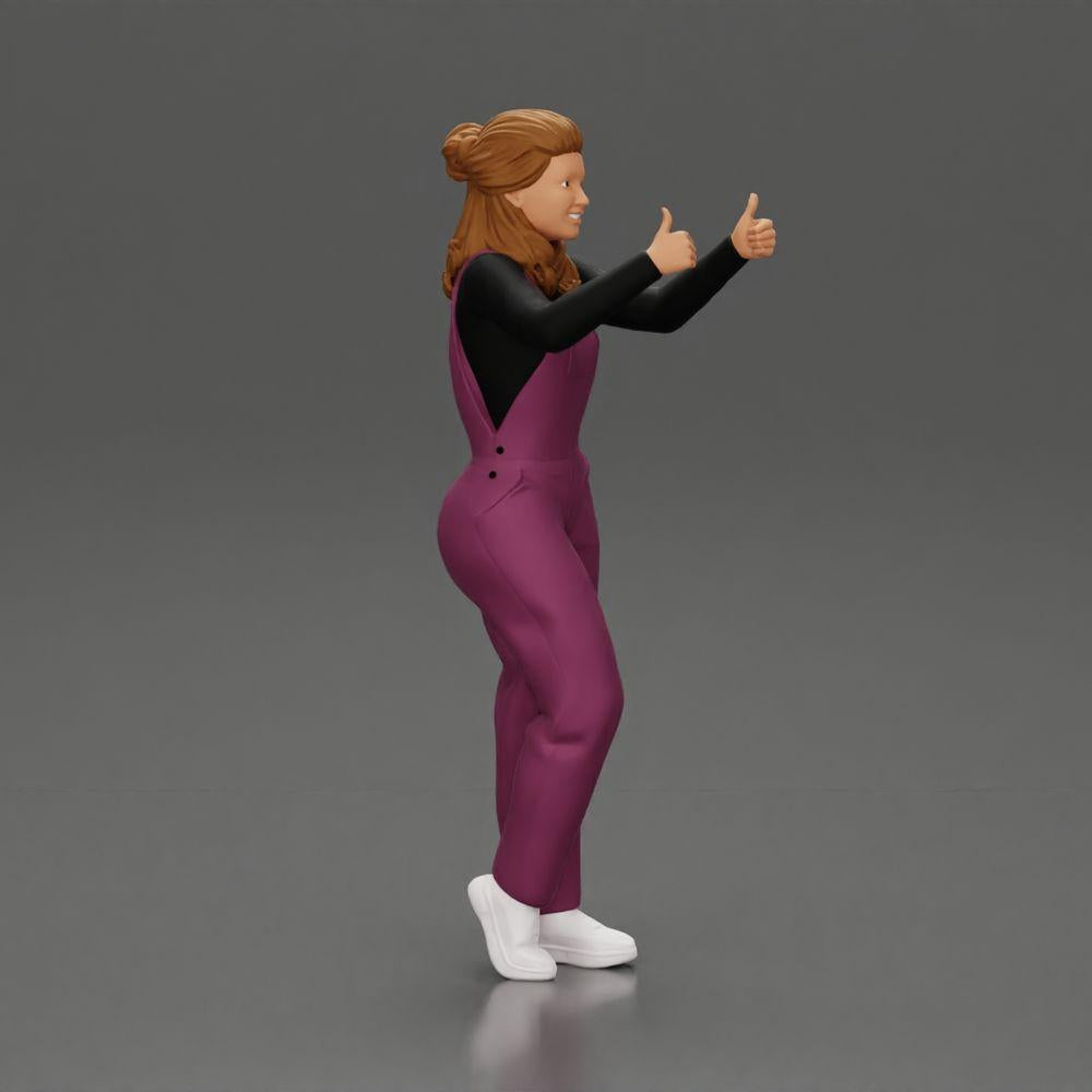 Diorama Modellbau Produktfoto 1: Stehendes, lächelndes Mädchen in Latzhose, beide Daumen hoch - Diorama-Figur (Ref Nr. A82)