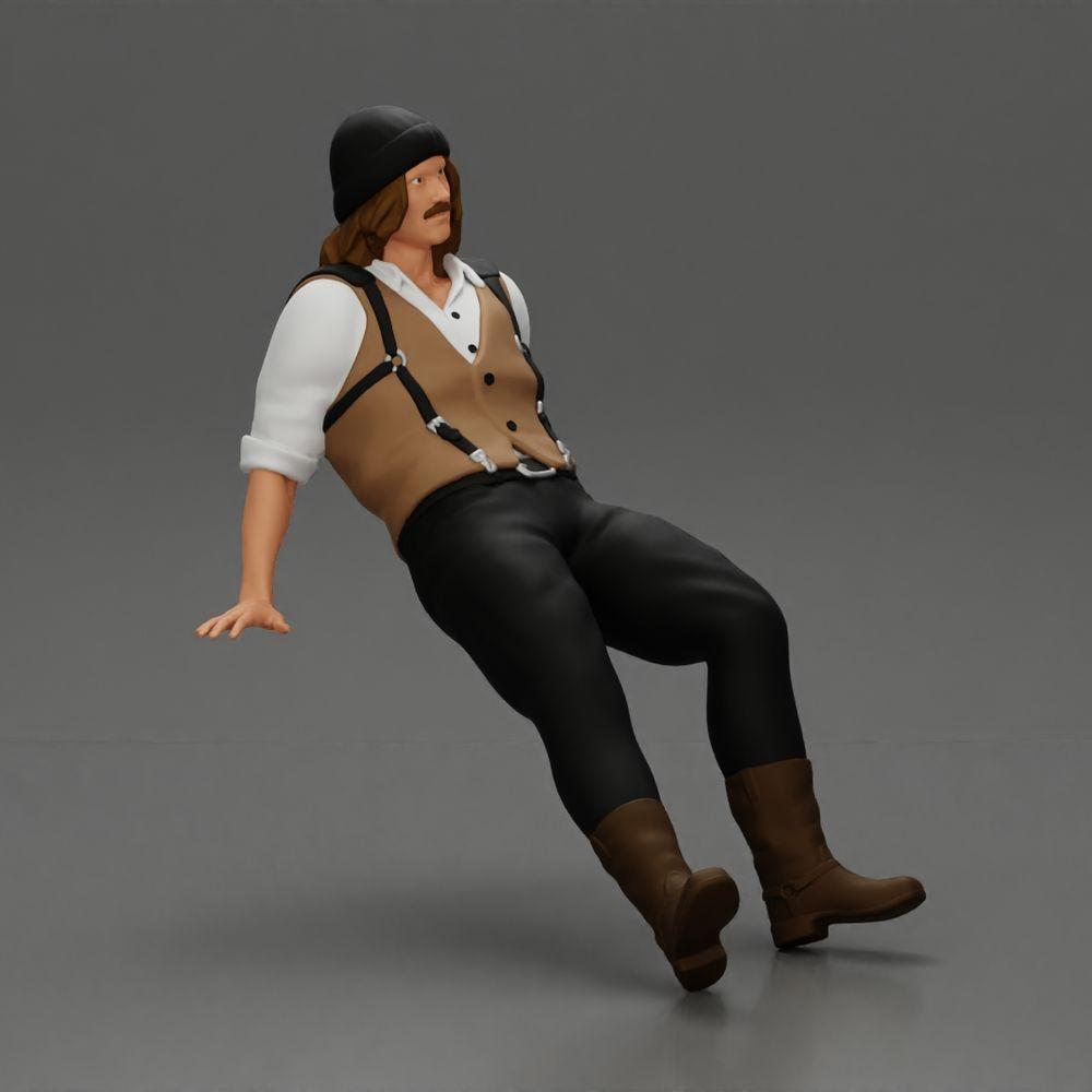Diorama Modellbau Produktfoto 1: Sitzende Miniaturfigur, Mann in historischer Kleidung mit Mütze und Hosenträgern (Ref Nr. A84)