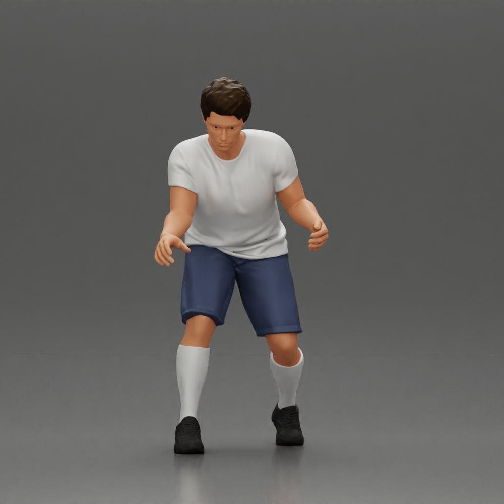 Diorama Modellbau Produktfoto 1: Diorama-Miniatur: Mann in Shorts beim Tischfußball, T-Shirt & hohen Socken (Ref Nr. A71)