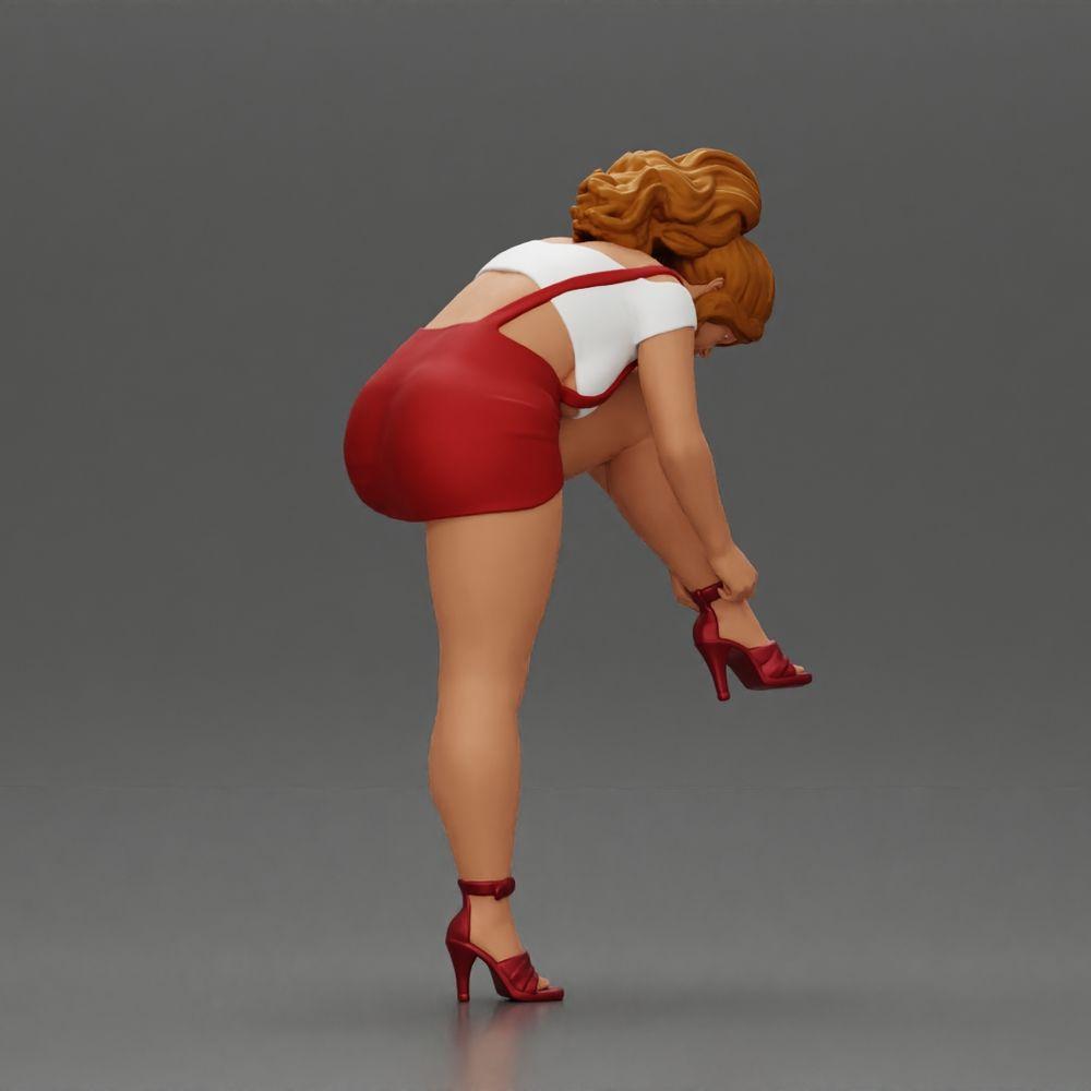 Diorama Modellbau Produktfoto 1: Diorama Figur: Miniaturfigur - Frau zieht roten High Heel an, stehende Pose für Diorama (Ref Nr. A112)