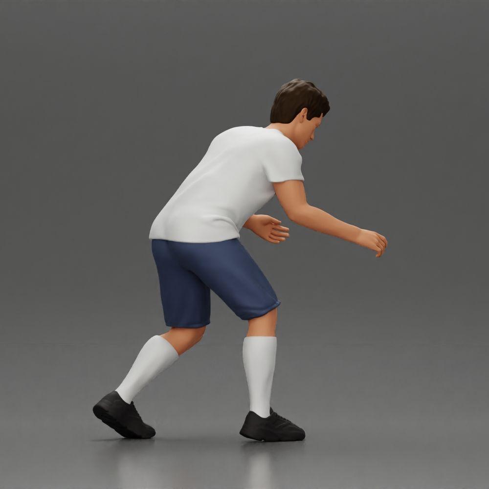 Diorama Modellbau Produktfoto 3: Diorama-Miniatur: Mann in Shorts beim Tischfußball, T-Shirt & hohen Socken (Ref Nr. A71)