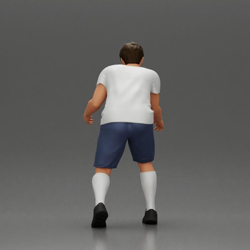 Diorama Modellbau Produktfoto 4: Diorama-Miniatur: Mann in Shorts beim Tischfußball, T-Shirt & hohen Socken (Ref Nr. A71)
