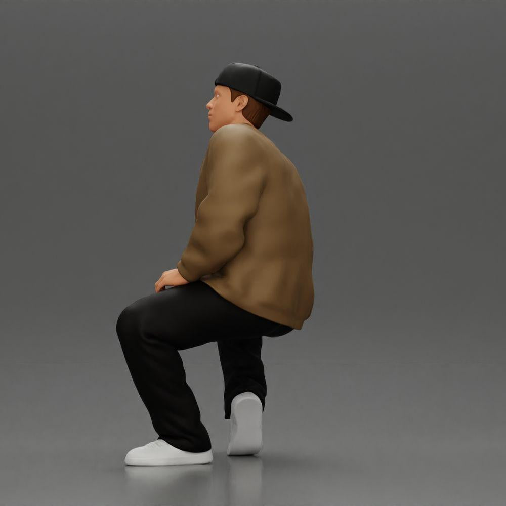 Diorama Modellbau Produktfoto 4: Diorama-Figur: Sitzender Hip-Hop-Mann mit Jacke, Cap und Sneakers (Ref Nr. A62)