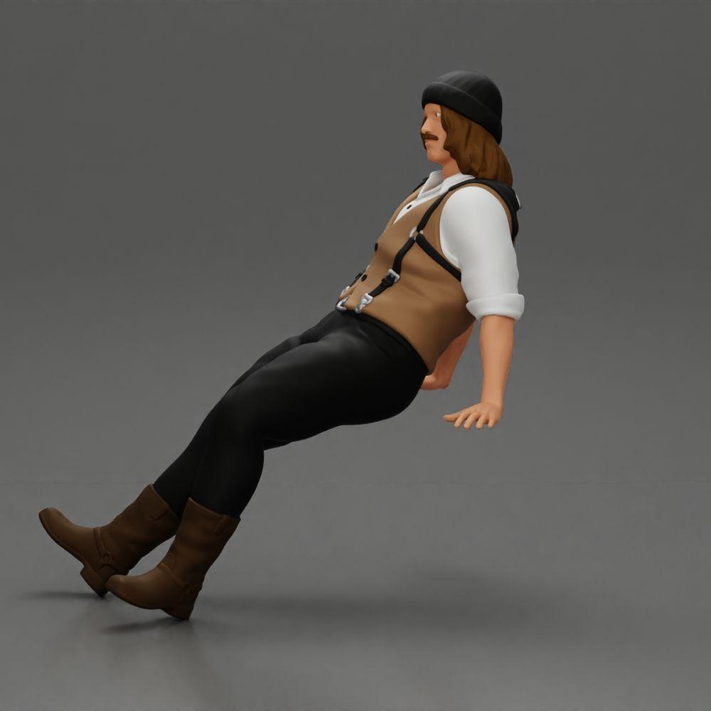 Diorama Modellbau Produktfoto 5: Sitzende Miniaturfigur, Mann in historischer Kleidung mit Mütze und Hosenträgern (Ref Nr. A84)