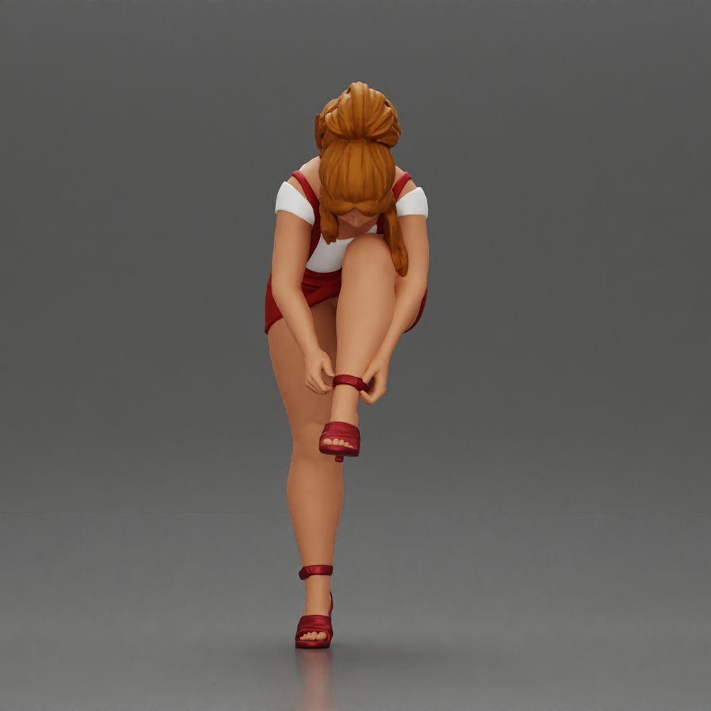 Diorama Modellbau Produktfoto 5: Diorama Figur: Miniaturfigur - Frau zieht roten High Heel an, stehende Pose für Diorama (Ref Nr. A112)
