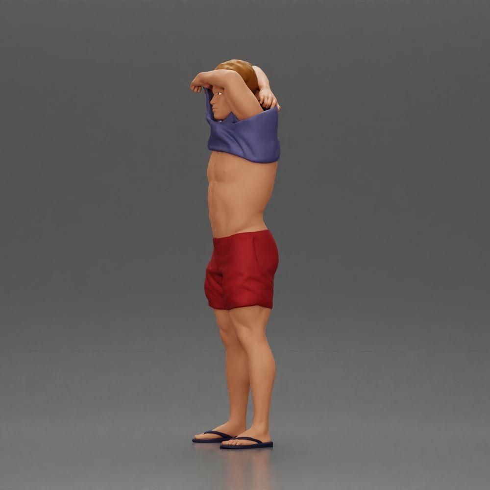 Diorama Modellbau Produktfoto 5: Stehende Miniatur: muskulöser Mann in Shorts zieht T-Shirt über den Kopf (Ref Nr. A90)