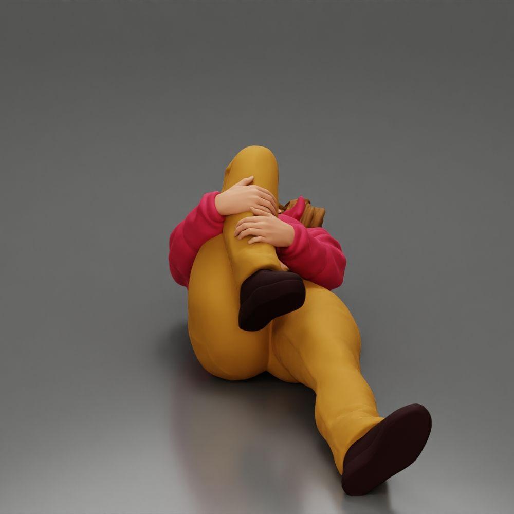 Diorama Modellbau Produktfoto 5: Liegende Frau mit Minijacke hält verletztes Knie - Diorama-Miniatur (Ref Nr. A87)