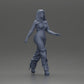 Diorama Modellbau Produktfoto 6: Diorama Figur: Miniatur-Figur Frau in Gehpose, grün-rot, Kurztop, weite Hose, Pumps (Ref Nr. A141)