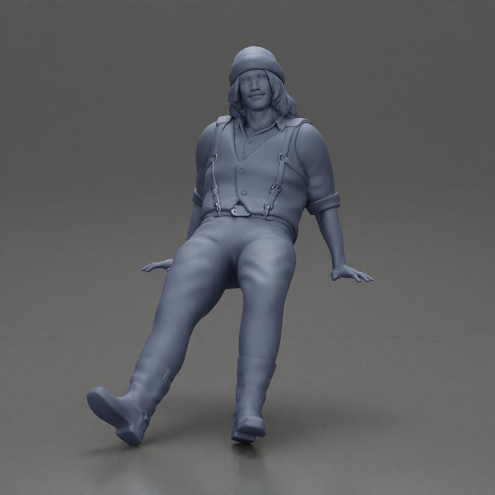 Diorama Modellbau Produktfoto 6: Sitzende Miniaturfigur, Mann in historischer Kleidung mit Mütze und Hosenträgern (Ref Nr. A84)