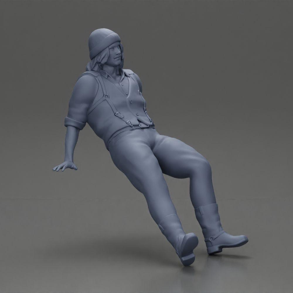 Diorama Modellbau Produktfoto 7: Sitzende Miniaturfigur, Mann in historischer Kleidung mit Mütze und Hosenträgern (Ref Nr. A84)