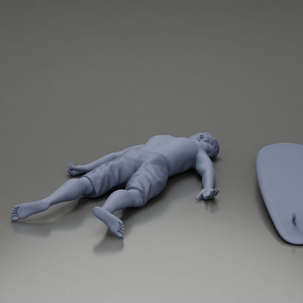 Diorama Modellbau Produktfoto 7: Diorama-Miniatur: Liegende Person bäuchlings neben Surfbrett mit Finnen (Ref Nr. A66)