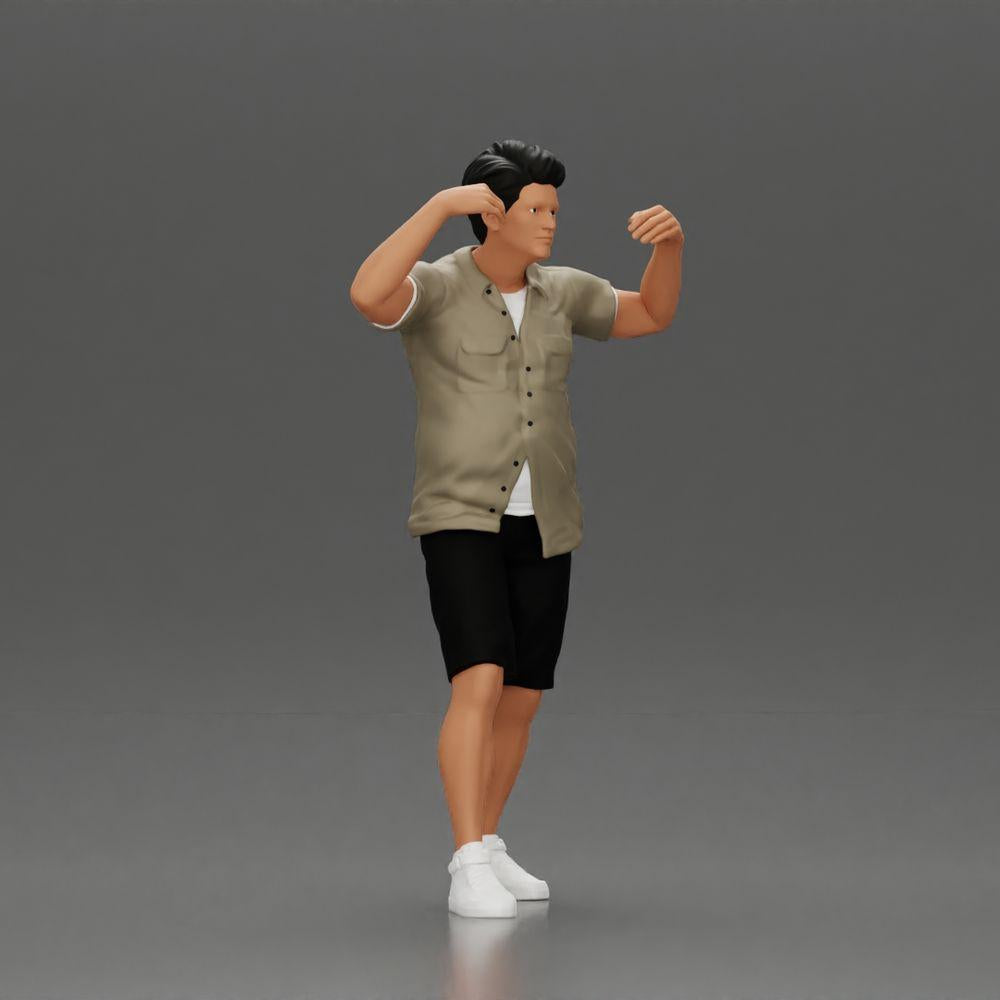 Diorama Modellbau Produktfoto 1: Diorama-Miniatur: Mann in Hemd und Shorts trägt Frau auf Schultern (Ref Nr. A81)