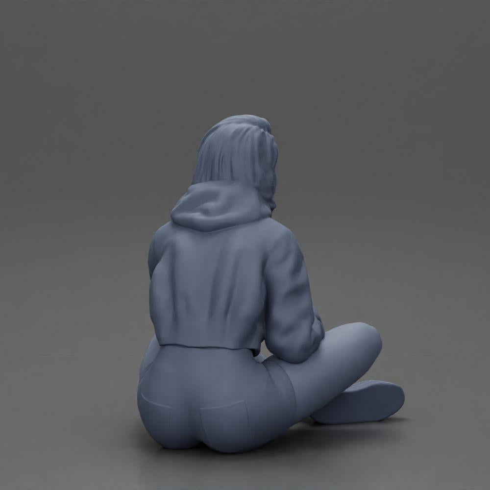 Diorama Modellbau Produktfoto 19: Diorama-Miniatur: Sitzende Frau in Jacke und Shorts mit offenem Regenschirm (Ref Nr. A85)
