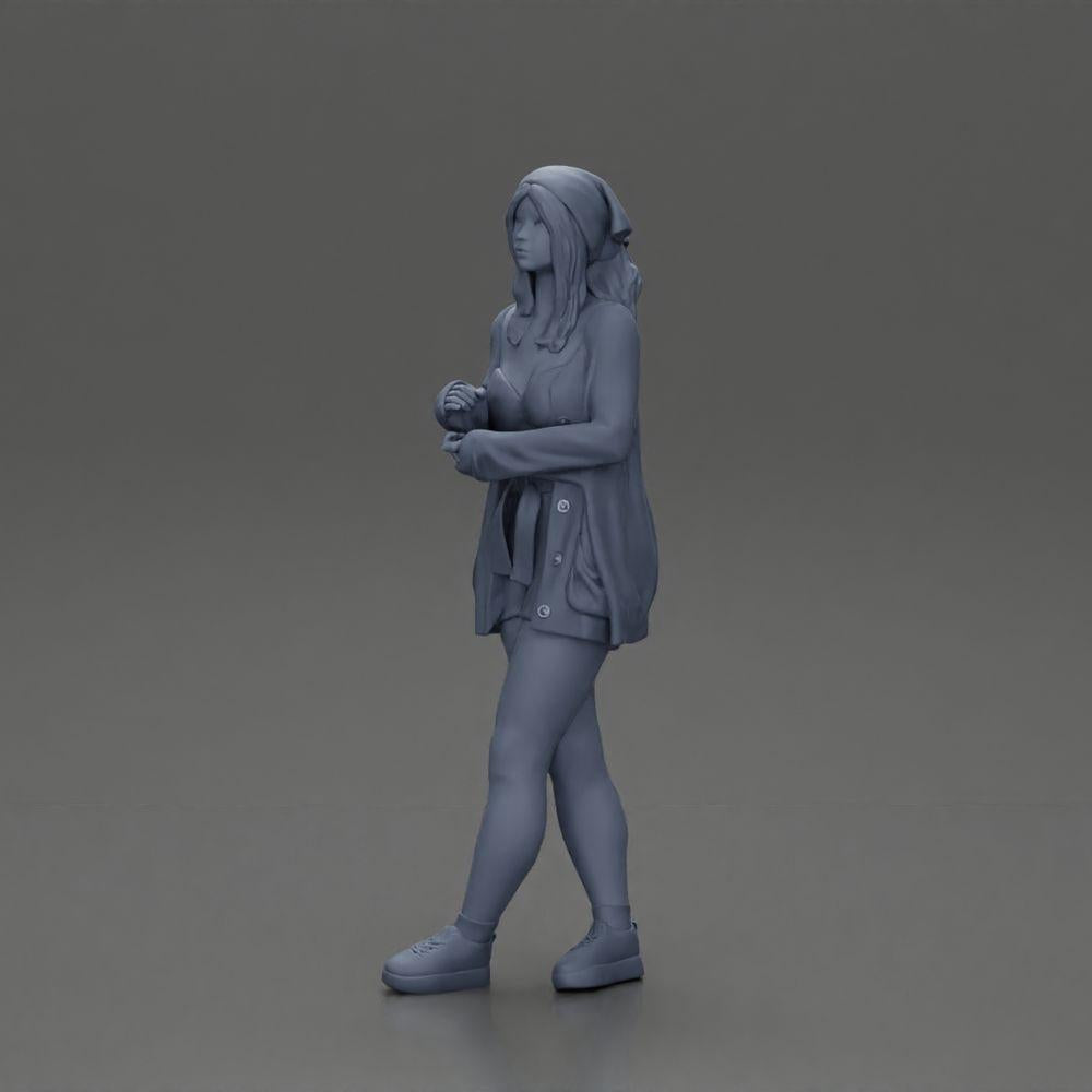 Diorama Modellbau Produktfoto 17: Weibliche Diorama-Figur in offener Strickjacke und kurzen Hosen mit Regenschirm (Ref Nr. A92)