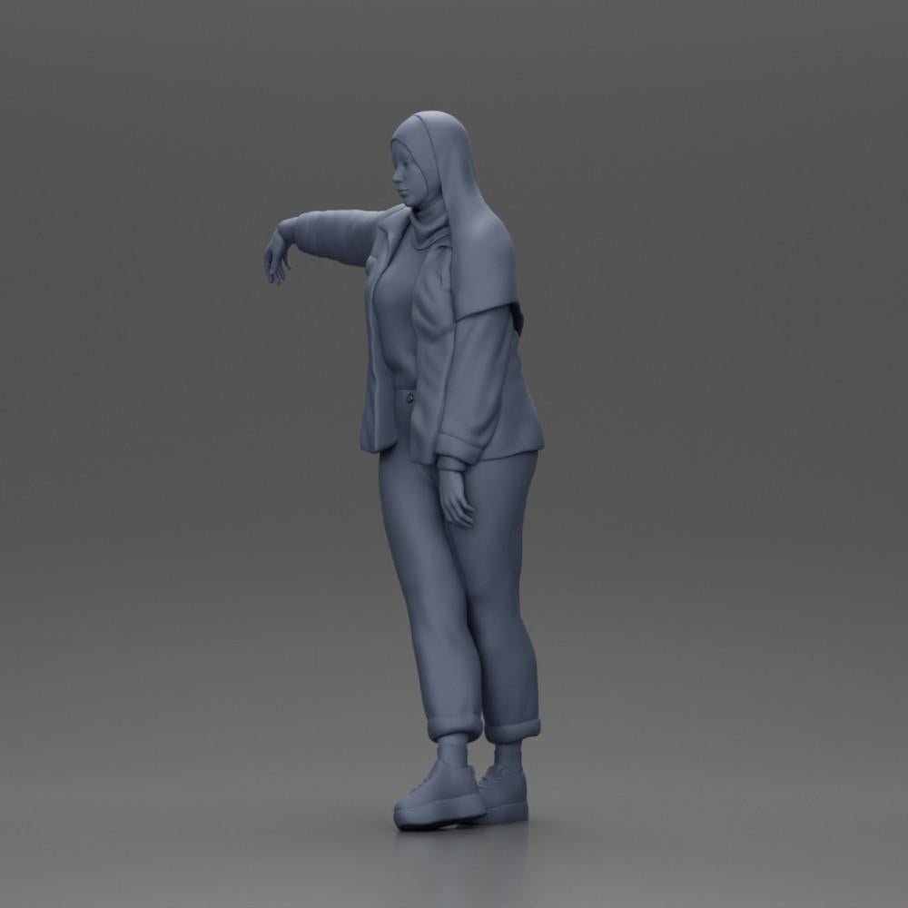 Diorama Modellbau Produktfoto 11: Diorama-Figur Frau mit Kopftuch und Jacke, am Auto lehnend, Arm ausgestreckt (Ref Nr. A59)