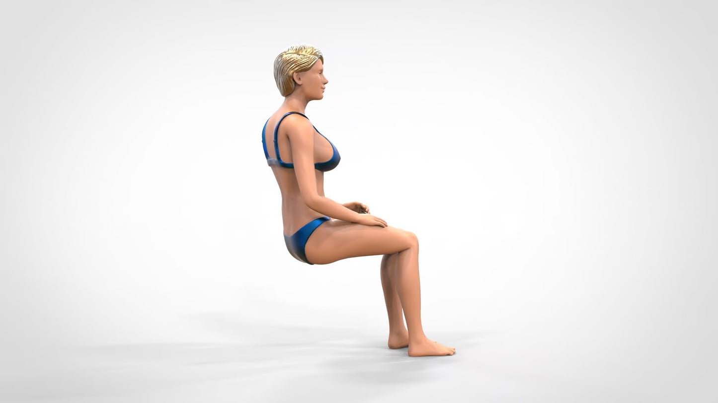 Produktfoto  0: Frau im Bikini - sitzend